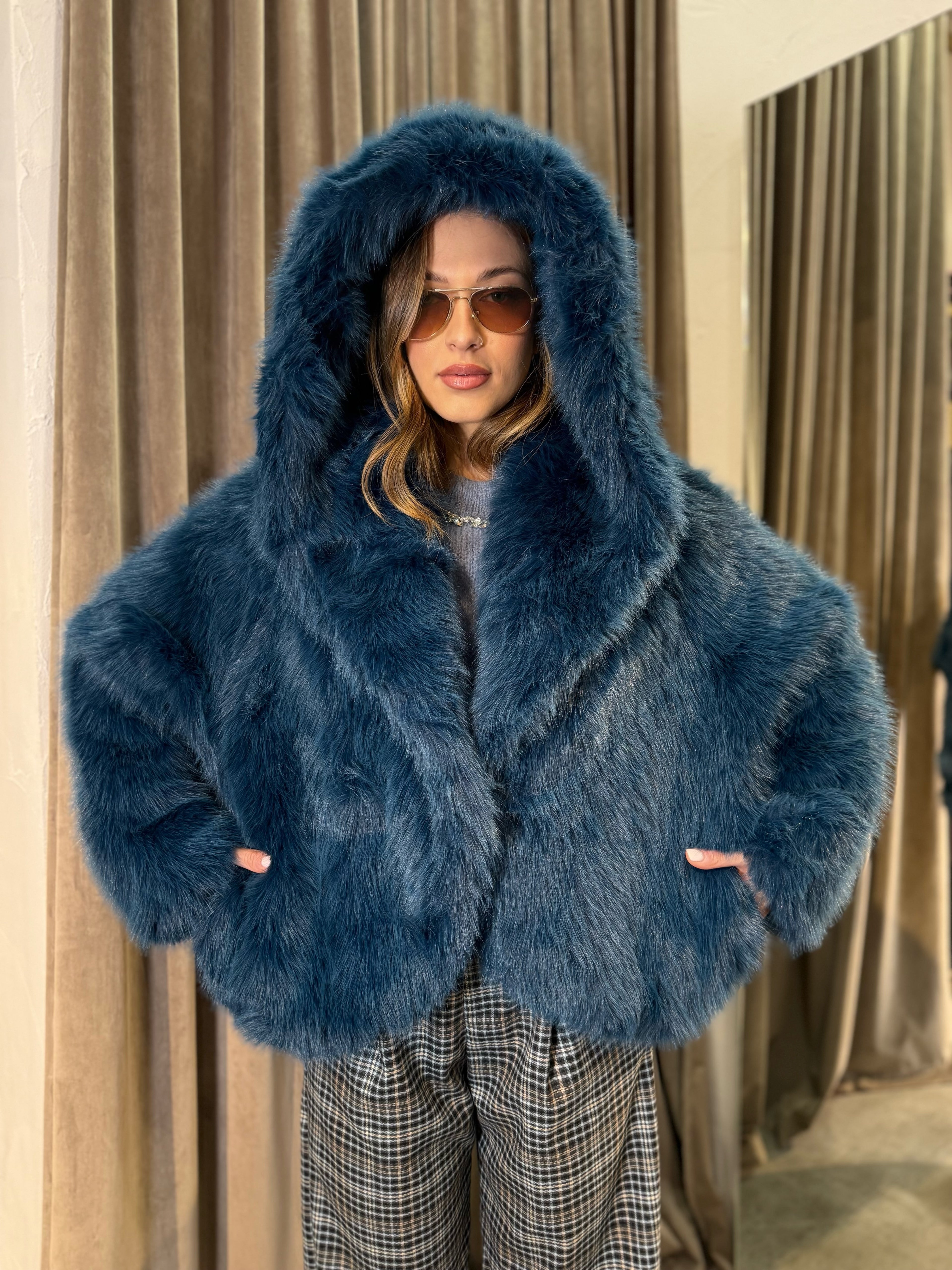 Eco pelliccia con cappuccio