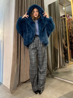 Eco pelliccia con cappuccio