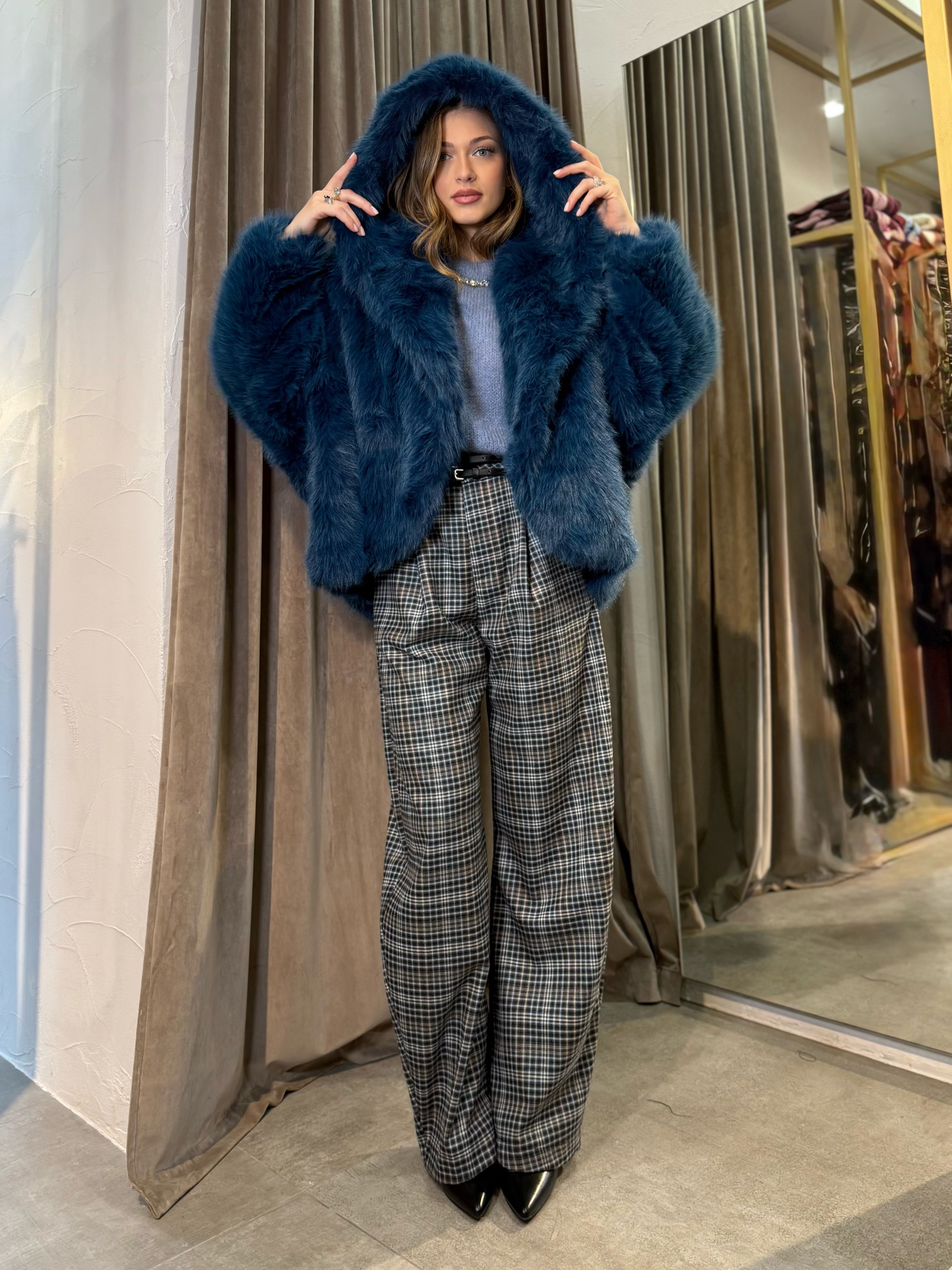 Eco pelliccia con cappuccio