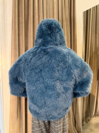 Eco pelliccia con cappuccio